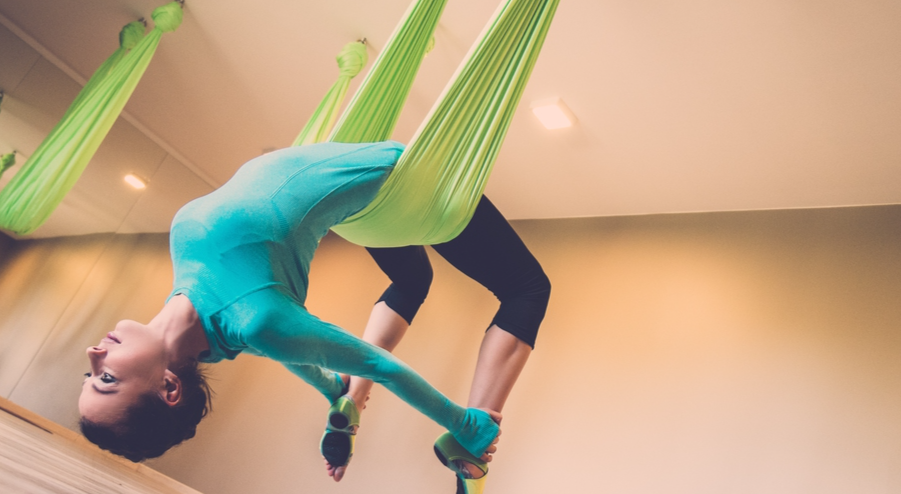 What Is Aerial Yoga? Benefits, Risks, and How to Start Safely